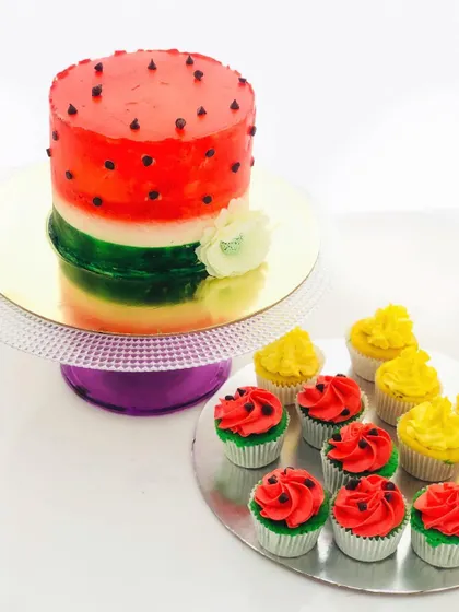 A fruit-themed buttercream cake from our celebration work... colourful fruit details carry the party theme across the design.