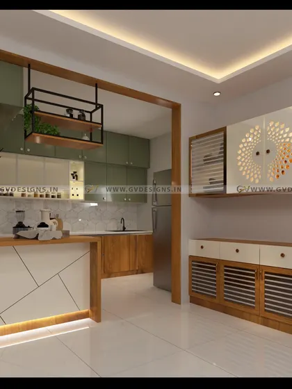 This view showcases the kitchen's exterior, featuring a side crockery unit and an integrated pooja space with CNC-cut doors. The breakfast counter is detailed with geometric laminate grooves and illuminated by a soft LED strip light.