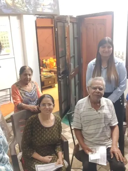 Our team with a family, all smiles after completing the paperwork for their new solar system. We handle the process from start to finish.