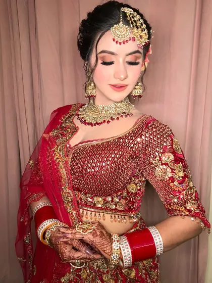A quiet, elegant pose showing the soft shimmer on the eyes.