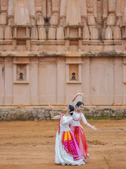 The beauty of Kathak is in the details. This pose showcases the delicate hand gestures and the flowing lines of the body, telling a story with every movement.