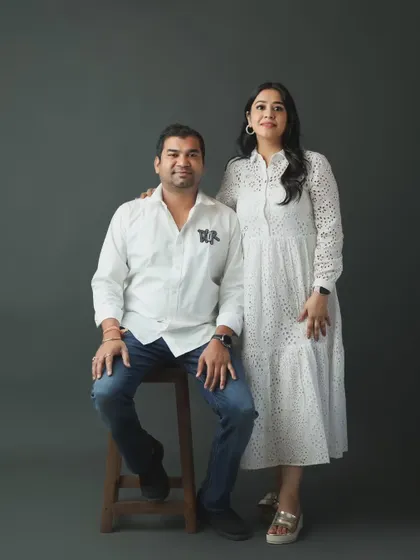 A simple and elegant studio portrait of a couple. Before the kids join in, we love to take a few moments to capture the parents together, celebrating their connection.