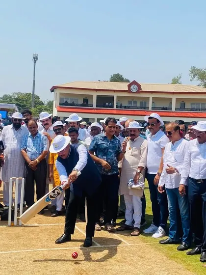 A dignitary plays a shot during the opening ceremony, symbolizing the start of a new innings for cricket in Panvel.