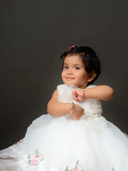 An adorable, expressive portrait of a toddler. These simple, clean shots beautifully capture a child's personality.
