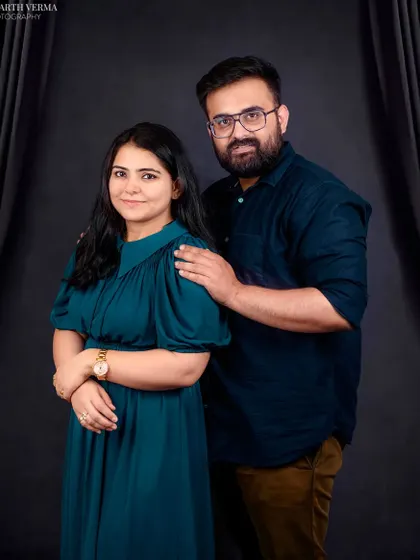 A beautiful couples portrait. This shot focuses on the parents, reminding us that every family story begins with the love between two people.