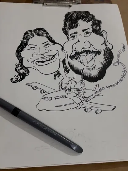 The initial sketch for the travel-loving couple. This black and white drawing shows the composition and expressions before I bring the scene to life with vibrant watercolors.