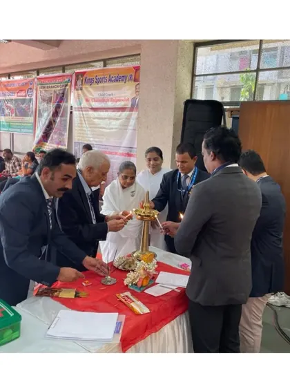 The traditional lamp lighting ceremony to inaugurate our state-level championship, seeking blessings for a successful event.