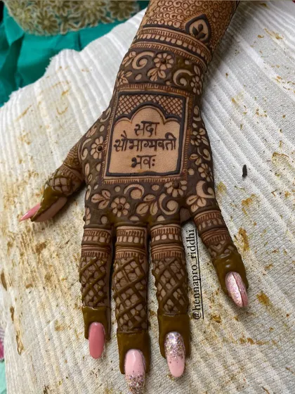 A classic and elegant back-hand design. The Sanskrit blessing "Sada Saubhagyavati Bhava" (may you always be fortunate) is a beautiful and traditional touch for any bride.