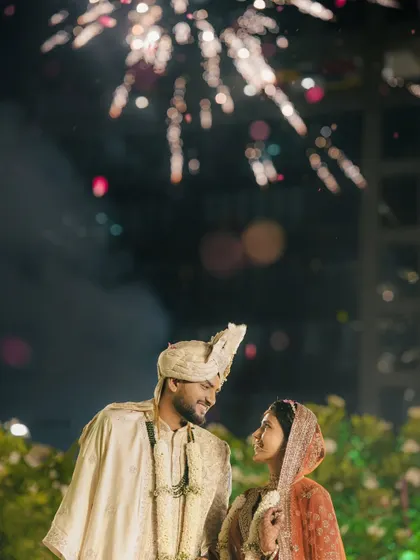 Ending the night with a bang. We capture the grand finale moments, like this stunning fireworks display, to provide a perfect, romantic end to your wedding album.