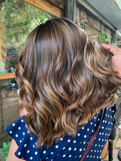 A close-up of the beautiful, glowing brunette tones. The waves really make the color pop. (No filter)