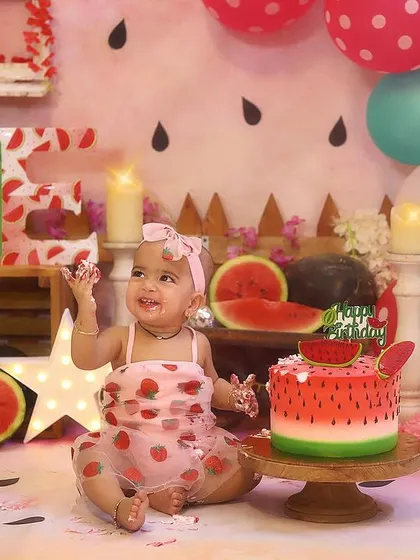 The aftermath of a successful cake smash is always the cutest. She's so happy with her messy, delicious celebration.