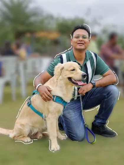 A proud dog dad posing with his Golden Retriever on our spacious lawn. The perfect place to run, play, and chill.