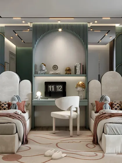 A sophisticated and symmetrical twin bedroom. The elegant headboards and shared central desk are framed by beautiful arched wall details, creating a very chic and grown-up feel.