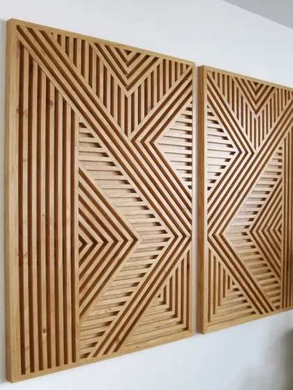 This set of two modern wood art panels features a striking symmetrical design. The natural wood grain and geometric patterns create a powerful visual impact.