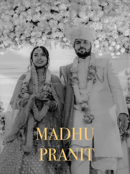 A black and white portrait of a couple on their wedding day, with their names elegantly overlaid.