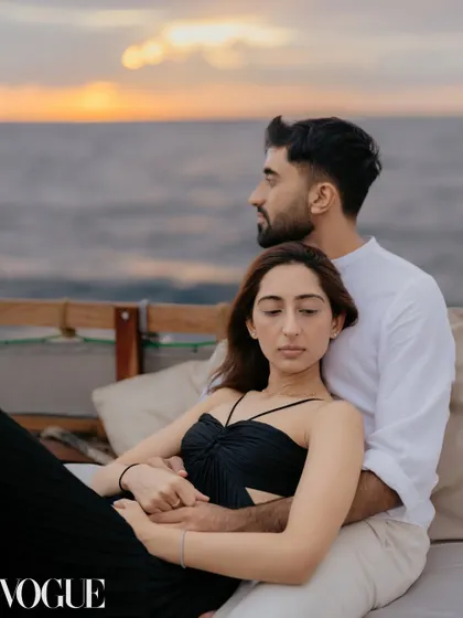A quiet moment for Dhwani and Vishal on a boat at sunset in Zanzibar. This intimate pre-wedding photo captures the calm and deep connection they share, away from all the wedding madness.