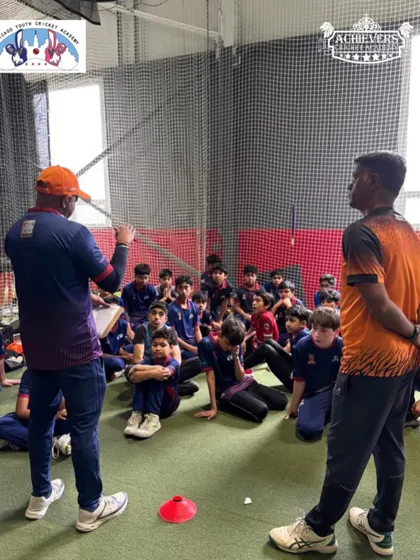 A group of aspiring young cricketers at CYCA listening intently to our coaches during the selection trials. We are looking for passion, skill, and a willingness to learn.
