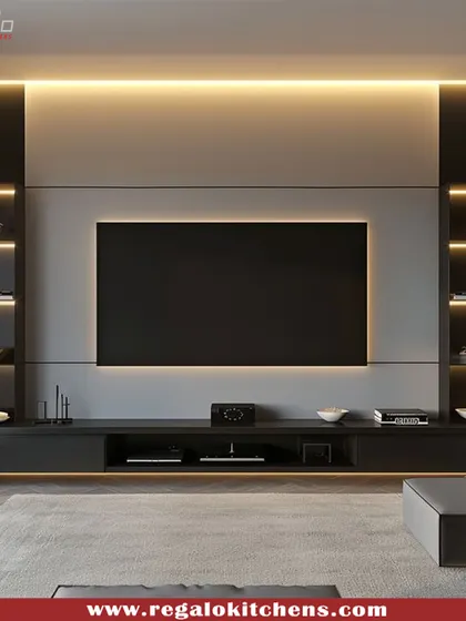 We design living room cabinetry that becomes the focal point of the space. This modern TV unit features a minimalist black finish, integrated ambient backlighting, and open shelving for a clean, sophisticated entertainment hub.