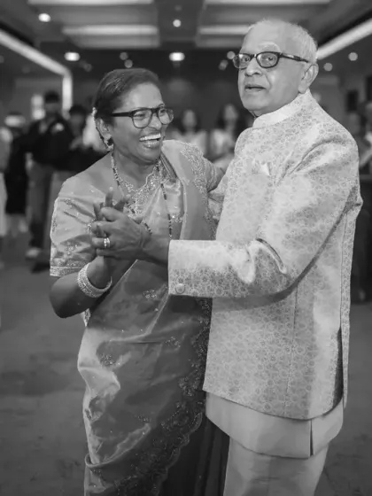 A black and white shot of the happy couple dancing at their 50th-anniversary party. The timeless quality of the photo matches their enduring love.
