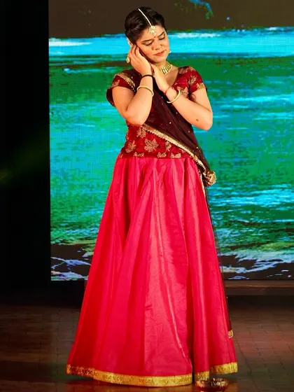 A beautiful moment captured from the production 'Krishna Katha'. Here, I am portraying a gopi, adorned in traditional attire, listening to the tales of Krishna's divine play.
