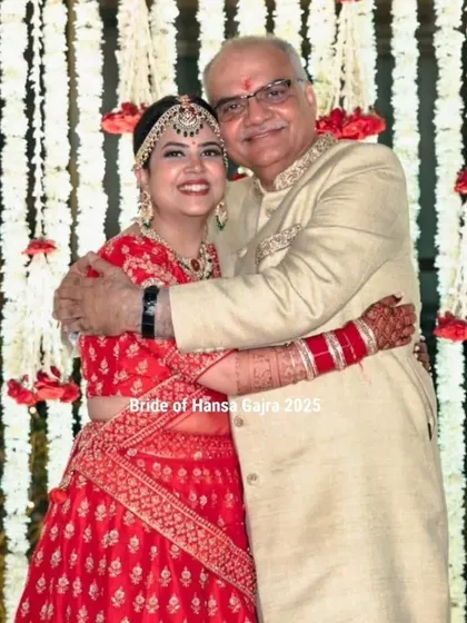 An emotional and heartwarming moment between the bride and her father. Her mehendi-adorned hands are part of this beautiful memory of love and blessings.