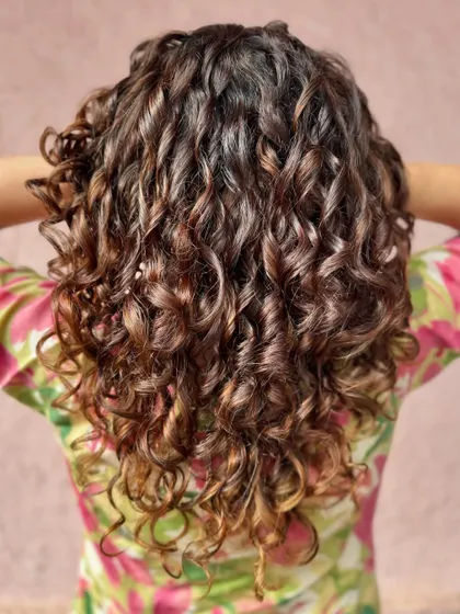 The back view of this chocolate swirl look. The curls are so defined and bouncy. (No filter)