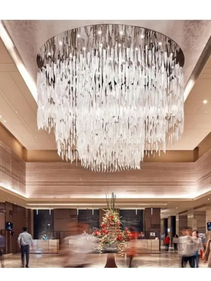 For the Sheraton Hotel in Bangalore, we designed this grand lobby centered around a custom chandelier. The fixture acts as a dramatic focal point, demonstrating our expertise in creating luxurious and memorable hospitality interior concepts.
