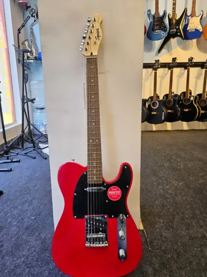 The Squier Sonic Telecaster in a bold Torino Red finish. This guitar features a slim "C" shape neck profile for comfortable playing and two single-coil pickups for that classic Telecaster twang.