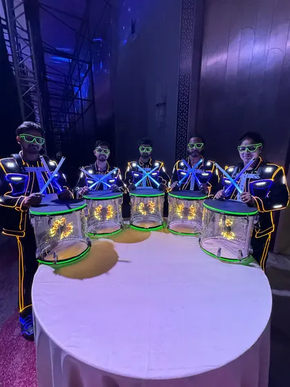 Our LED Drummers ready to perform for a Tata Motors event. The combination of glowing glasses, suits, and drums makes for a visually cohesive and striking look.