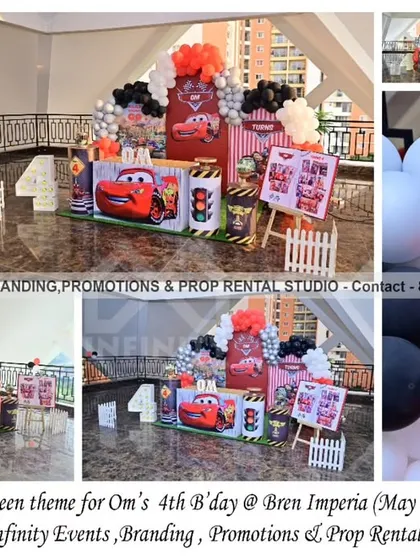 OM turns four with a thrilling Lightning McQueen theme at Bren Imperia. The setup is packed with character cutouts, a "4" table, and a red, black, and white balloon arrangement, creating an action-packed race day atmosphere.