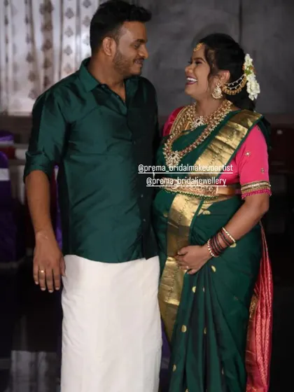 A candid and loving moment between the couple during the baby shower.