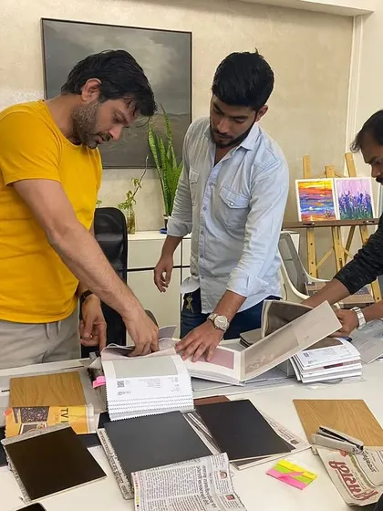 A glimpse into a team discussion at the office. Collaboration is key to our process; we believe the best ideas come from working together.