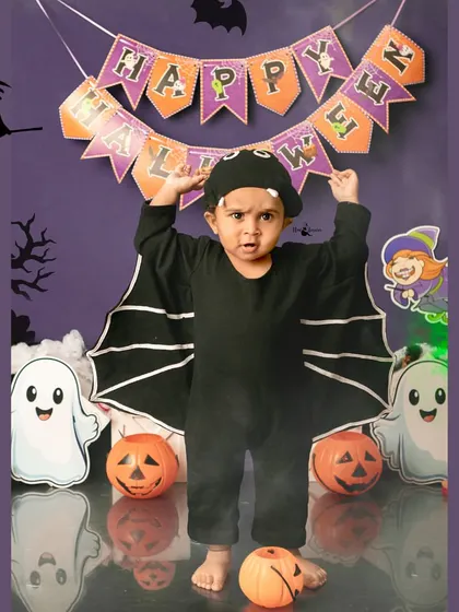 A mighty roar from a little bat. We love capturing the fun and imaginative play during our Halloween photoshoots.