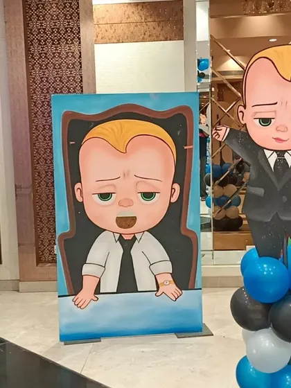 A fun photo opportunity cutout where kids can pose as the Boss Baby. Interactive elements like this are always a hit.