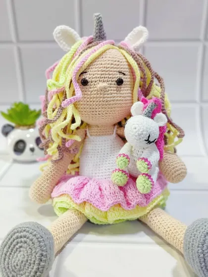 Meet my magical unicorn doll, complete with her own tiny unicorn friend. I designed this piece to be a cherished companion, crafted with soft, premium yarn and detailed with care to spark imagination and endless cuddles.