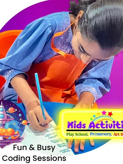 A student is deeply engaged in her work during one of our busy sessions. We nurture happy, creative minds by providing expert guidance and the freedom to explore various art forms.