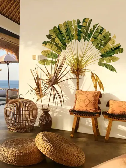 This beautiful seating area is enhanced by our Palm Tree wall sticker, creating a stunning and relaxing focal point. The design perfectly complements the natural and bohemian decor.