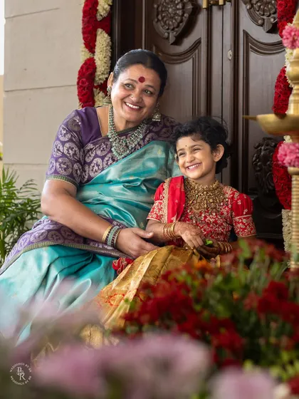 A heartwarming, candid photo of a grandmother and granddaughter sharing a laugh, showcasing the joy that spans generations.