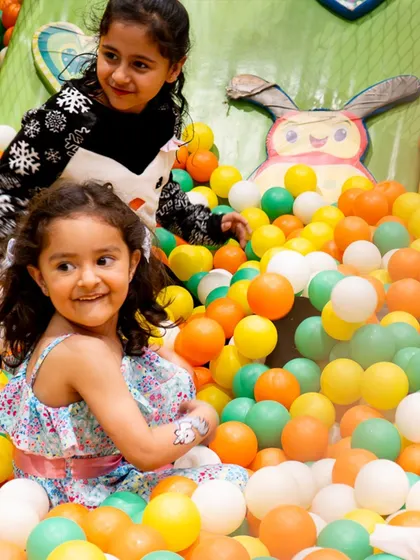 A happy moment in the ball pit during Meher's mermaid-themed party. The bright colors and endless fun make it a favorite spot for all our little guests.