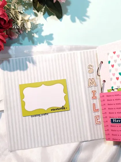 A simple page with "SMILE" spelled out, leaving room for journaling or photos.
