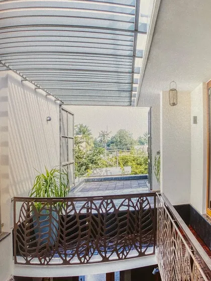 A detail shot of a balcony with custom-designed railings from "A Home by the Park," as seen in the book.