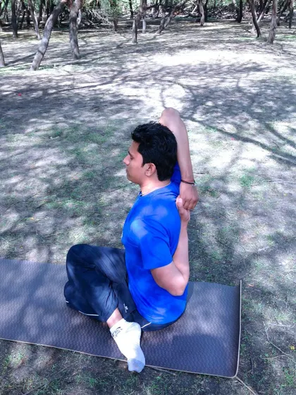 Gomukhasana, the Cow Face Pose, offers a deep stretch for the shoulders, triceps, hips, and thighs. This seated posture is excellent for improving posture and releasing tension stored in the shoulder girdle.
