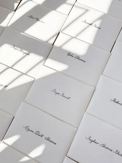 The finishing touches for the Adidas project. Each personalized certificate was enclosed in a subtly textured white envelope, carefully addressed with a brush pen, and sealed with a dark grey custom Adidas wax seal.