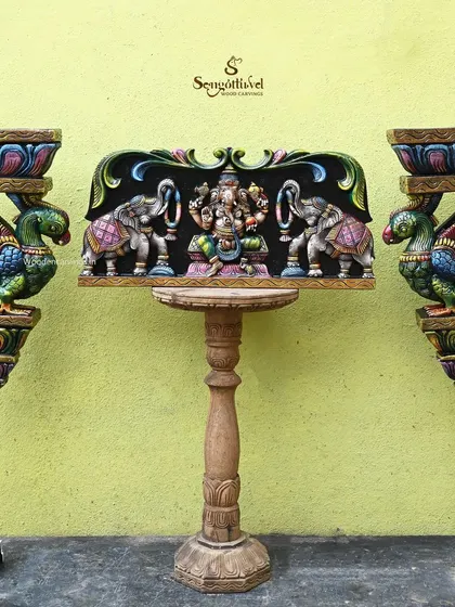 A 25-inch colored Gaja Ganesh panel displayed with a pair of 24.5-inch green parrot brackets. This composition shows how our pieces can be combined for a complete decorative set.