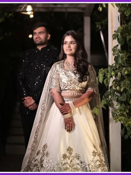 A beautiful shot of the couple on their Sangeet night, ready to make their grand entrance. We capture the anticipation and excitement.