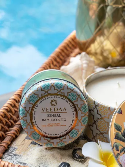 Our Bengal Bamboo & Fig candle, with its fresh, green fragrance, is perfect for a summer day. The beautifully designed tin adds a touch of elegance to your poolside relaxation.