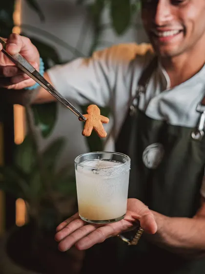 I revel in a drink that transcends the ordinary. The Paradiso is just that, a dance of silky tequila, the quiet fire of ginger, and the delicate grace of elderflower, all lifted by the sparkle of tonic. A little gingerbread man adds a touch of whimsy.