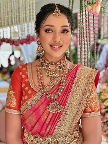 Malavika's radiant smile lights up her entire look.