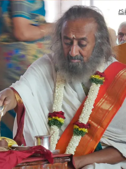 I am making an offering during the Rama Tarak Homa. The fire ceremony is a powerful way to connect with the divine and send out prayers for global peace and harmony.