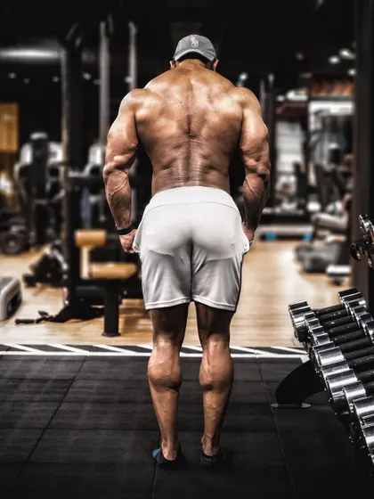 A full back view displaying the results of consistent effort. True transformation happens when you bring your best effort every single day, not just when you feel like it.